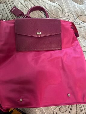 Tumi Hot Pink Travel Tote with Burgundy Leather Flap.